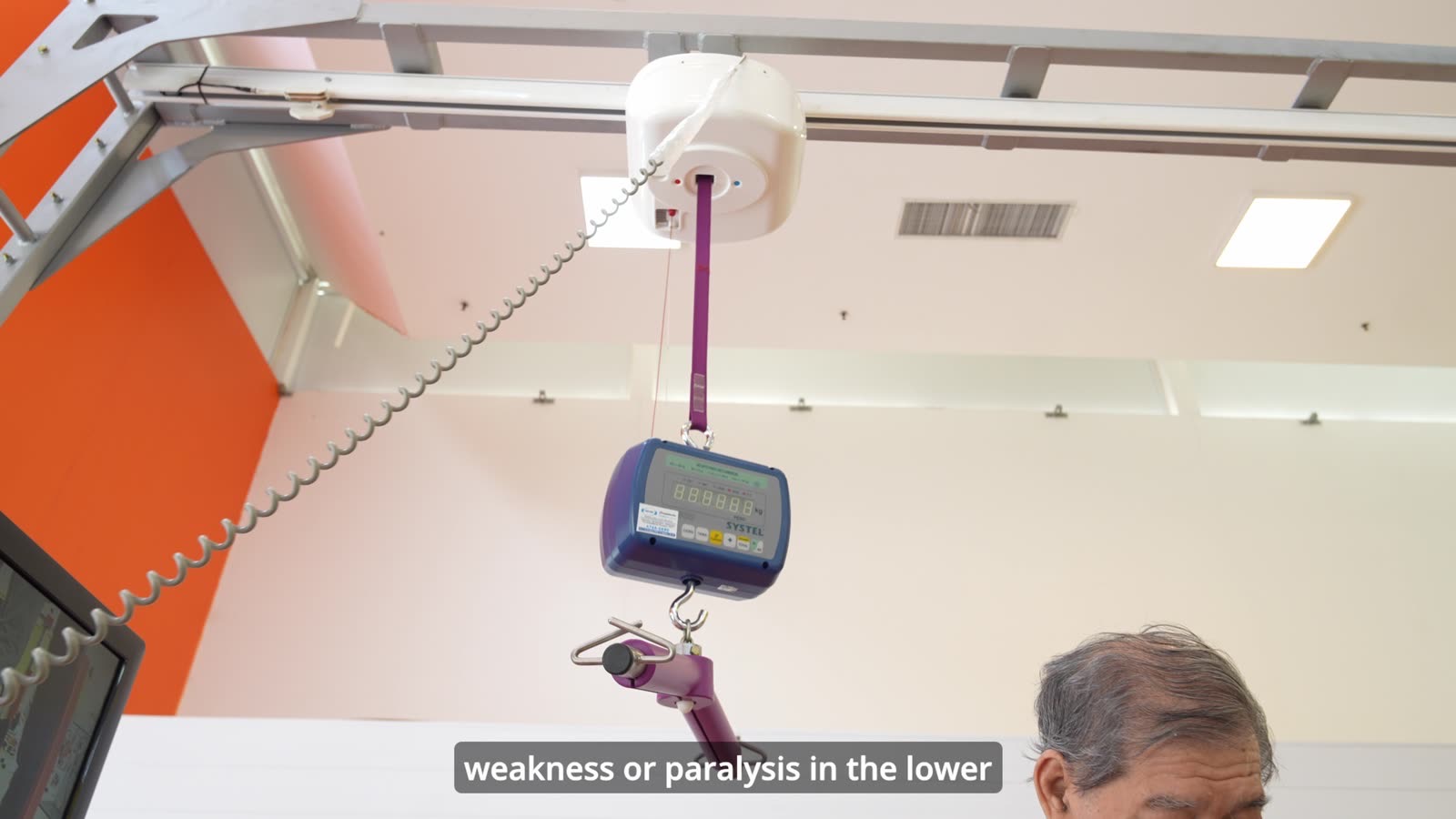 Overhead body-weight support system with a digital load cell, used for supported walking practice