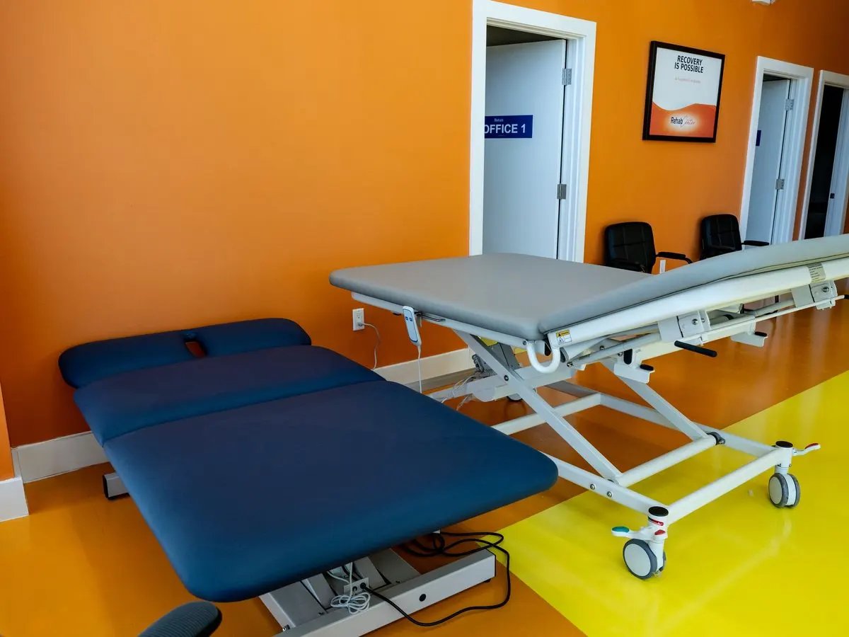 Accessible treatment table used for orthopedic and post-surgical rehabilitation at RehabCenter